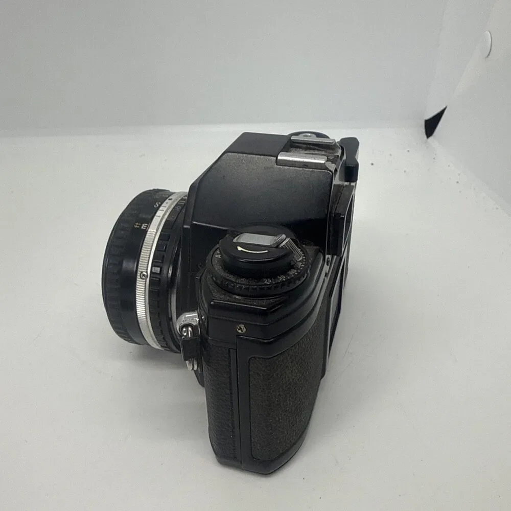 Vintage Nikon EM Black SLR Film Camera with Nikon Lens